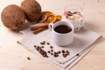 espresso in a cup and milky desert with fruit