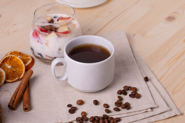 espresso in a cup and milky desert with fruit