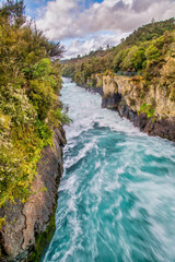 Fototapeta na wymiar Powerful water currents in th Huka Falls, Taupo - New Zealand