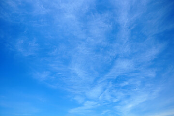 cirrus clouds on the blue sky