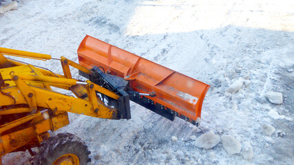 cleaning te street road from ice in winter