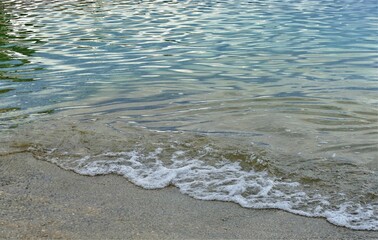 Wave in the sea and sand on the beach 