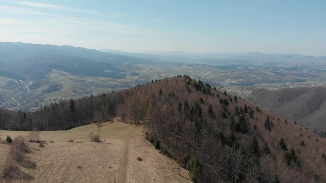 Panorama from bird eye of Beskids Mountains from Makowica in early spring, near Rytro Village, Poland.