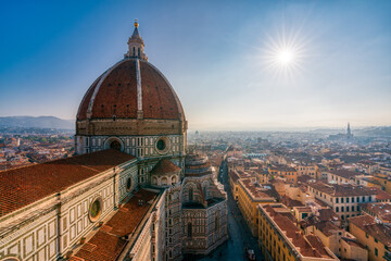 Fototapeta na wymiar Top view of Santa Maria del Fiore duomo church and Florence old city skyline in Italy.