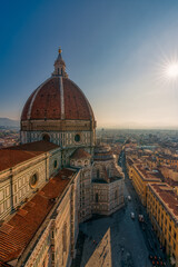 Fototapeta na wymiar Top view of Santa Maria del Fiore duomo church and Florence old city skyline in Italy.