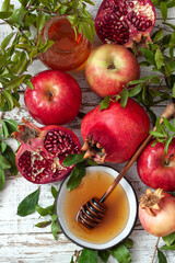 Rosh hashanah, jewish New Year holiday concept.Taditional symbols, apples, pomegranate, honey. 
