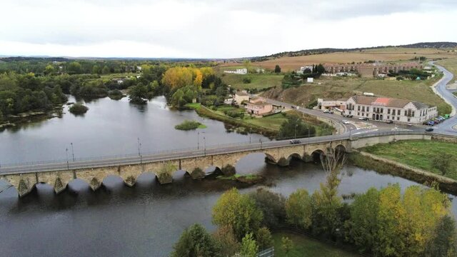 Salamanca.  Bridge in river. Village of Alba de Tormes, Spain. Aerial Drone Footage