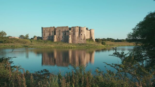 Carew Castle in the evening sunlight Pembroke Pembrokeshire Wales 