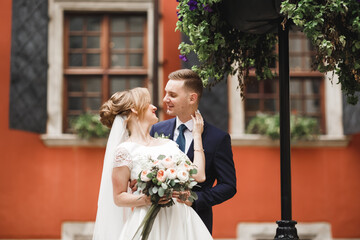 Luxury married wedding couple, bride and groom posing in old city