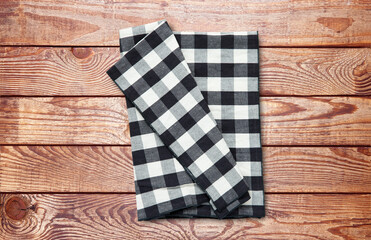 Obraz premium Napkin. Stack of dish towels on wooden desk. Top view