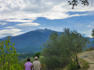 couple contemplating the summit of the Canigou
