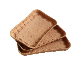 Biodegradable food trays made from pressed cardboard isolated on white background. Closeup