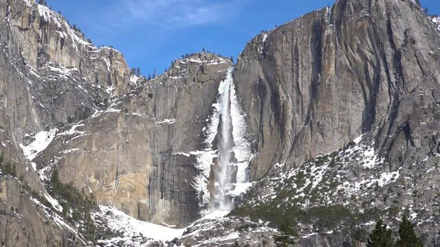 Close up shot of frozen Yosemite Falls in Winter at Yosemite National Park