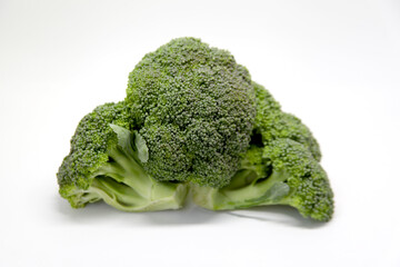 Broccoli, a vegetable with leaves, flowers and edible floral peduncles, widely used in world cuisine in salads and other dishes. It has many nutritional components