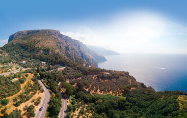 Fototapeta na wymiar San Pietro viewpoint. Road to Positano, Amalfi, Salerno. Aerial view Italy mountains, sea. Travel tour concept, Summer sunny day, Vacation. Nature. Copy space. Olive tree field