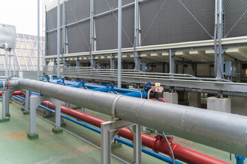 Chiller tower or cooling tower on rooftop of a office building. System work. Architecture machine....