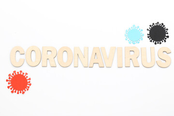 Text and paper Coronavirus on white background
