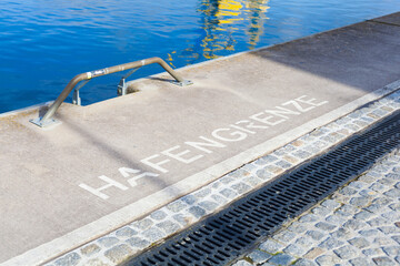 Harbor edge with lettering: 