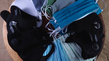Dust pollution and surgical protective reusable face masks. Shopping and marketing mask concept....