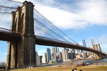 Fototapeta na wymiar Famous Brooklyn Bridge in New York City, USA with beautiful blue sky, in black and white, monochrome, Manhattan, USA. 