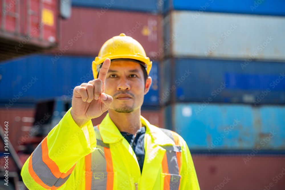 Aufkleber asian foreman working and checking container box for logistic export and import at logistic shipping