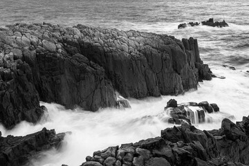 Long exposure of waves crashing on rocks. Tojinbo Cliff, Fukui prefecture, japan