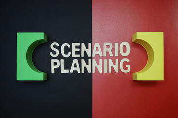 Scenario planning text on block letters with colorful blocks on red and black background 