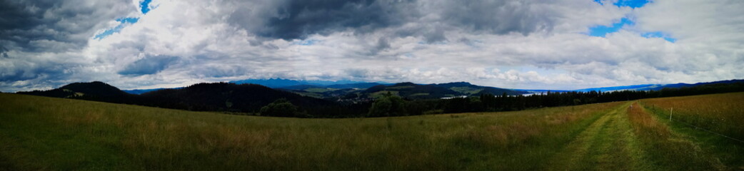 Panorama view of Tatras from Majerz pasture. Pieniny National Park. Czorsztyn. Poland