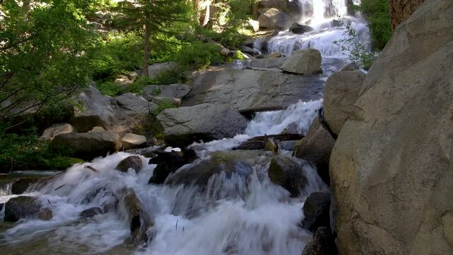 Cinematic tracking shot of waterfalls at Whitney Portal in Sierra Nevada Mountains