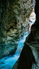 Clear water streams through gorge