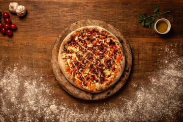 Top down pizza on wooden table for restaurant menu