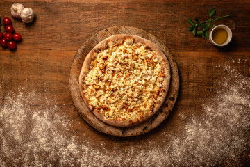 Top down pizza on wooden table for restaurant menu