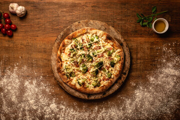 Top down pizza on wooden table for restaurant menu