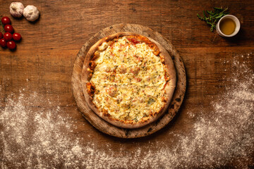 Top down pizza on wooden table for restaurant menu