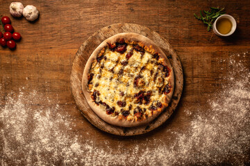 Top down pizza on wooden table for restaurant menu