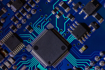 High-tech electronic board (PCB) with processor, microcircuits and luminous digital electronic...