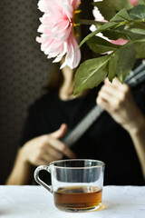 woman with cup of tea