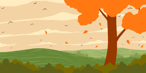 Autumn. Orange deciduous tree with orange leaves on the hill.