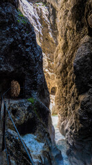 Clear water streams through gorge