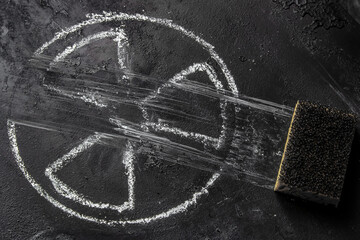 sponge-erased nuclear weapon symbol on black background