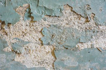 Grunge wall with cracked paint as background