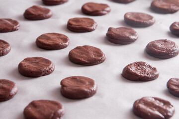 chocolate cookies on baking paper