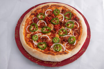 pizza with chili and tomatoes
