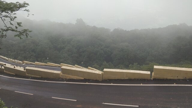 road in fog over  mountain of Matheran 