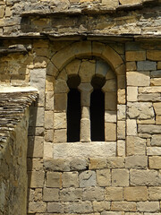 Bifora window of the Mozarab Pre-Romanesque or Romanesque Church of Santa Eulalia in the village of Susín. 11th century. Serrablo Region. Aragón. Spain.  