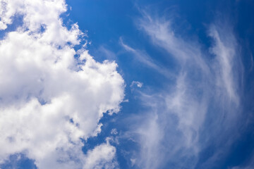 Blue sky and white puffy clouds