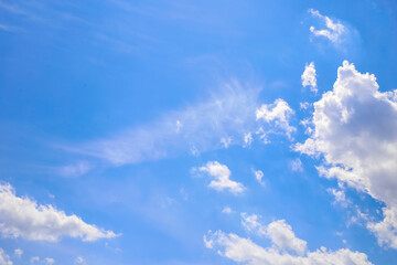 Blue sky and white puffy clouds
