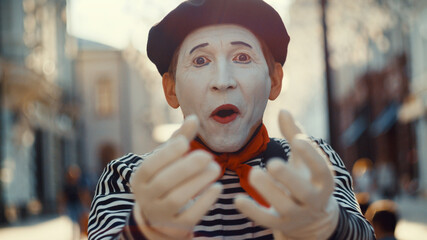 The face of a mime on the street