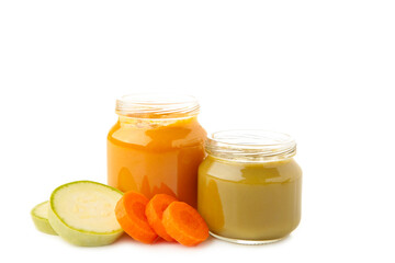 Fototapeta na wymiar Jars of baby puree isolated on white background. Carrot and broccoli purre