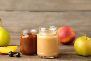 Fresh, organic pureed fruits for baby. Shot for a story on homemade, organic, healthy baby food on grey background